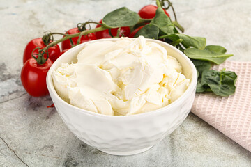Soft cream cheese in the bowl