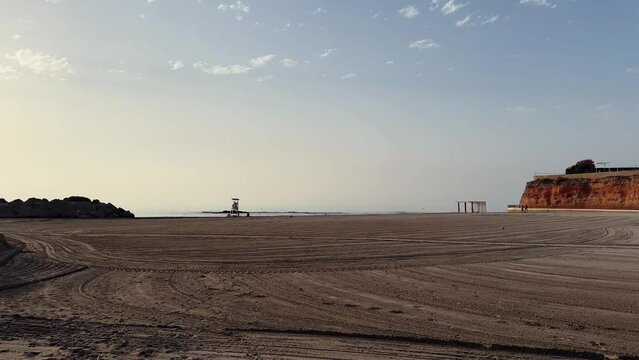Cala Capit&aacute;n, a Spanish playa in Costa Blanca. Orihuela Costa / Cabo Roig / Playa Flamenca. Beach and sea  in sunrise.