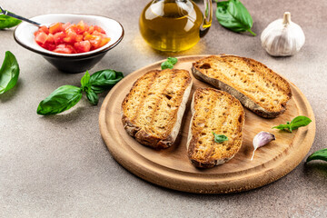 Toasted bread with garlic and extra virgin olive oil. Food recipe background. Close up