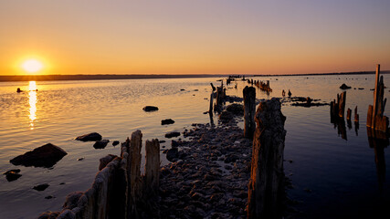 Sunset panorama on the Kuyalnik salt estuary. Dead Sea near Odessa Ukraine.