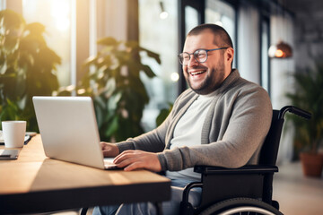 Happy Disabled Fat Man in Wheelchair Using Laptop