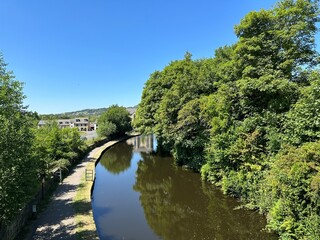 Fototapeta na wymiar View of the, Rochdale Canal, as it passes through countryside in, Norland, Sowerby Bridge, UK