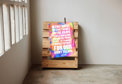Mockup of customizable vertical A2 poster fixed to wooden crate