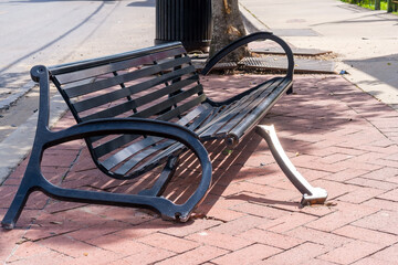 Crumpled Metal Bench that was Hit by a Car on a Street Corner in New Orleans, Louisiana, USA