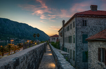 Evening view of the old town of Kotor, Montenegro from the fortress wall. The Bay of Kotor is a beautiful place on the Adriatic Sea. Kotor, Montenegro.