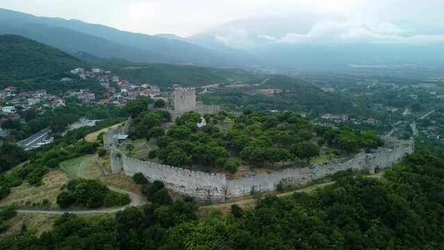Aerial view of Platamon castle in Greece. Crusader castle in Macedonia, Greece, located southeast of Mount Olympus. Drone view of the medieval castle.	
