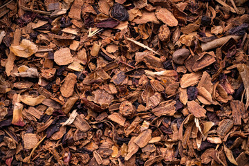 close-up top view of infusion made of cinnamon, apple and hibiscus