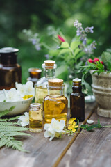 Fototapeta na wymiar Natural beauty cosmetic skincare homemade products with pure essential oils, herbal extracts. Concept of organic ingredients in cosmetology, dermatology, body care treatment, massage