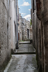 An old historical narrow street in Vrgada, Croatia. Mediterranean arhitecture.