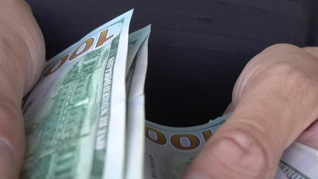 Adult Counting Benjamins Dollars Close Up Holding