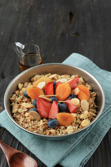 Granola with Bluebrry, Strawberry, and Almond Slice.