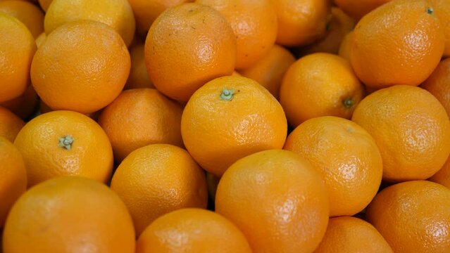 Image of ripe oranges on the counter in supermarket