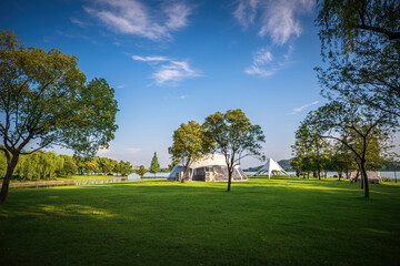 Fototapeta premium Camping tent on the grass in a sunny day
