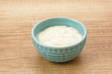 Fresh Healthy Plain Yogurt in a small bowl
