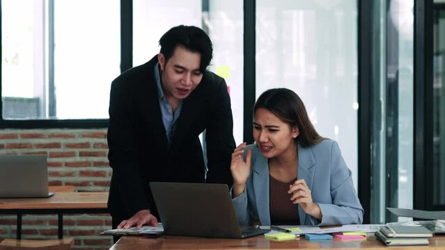 Stressed business woman with colleagues,Business,Teamwork,People and crisis concept.