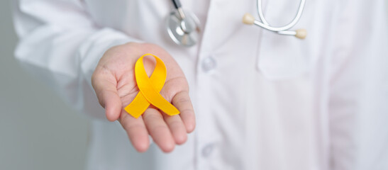 Yellow September, Suicide prevention day, Childhood, Sarcoma, bone and bladder cancer Awareness month, Yellow Ribbon for supporting people life and illness. Healthcare and World cancer day concept