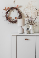 Autumn decor in the living room interior in Scandinavian style