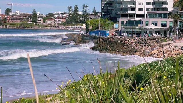 HD Video- Handheld Shot -Close up at North Cronulla Beach in Sydney, NSW, Australia, after the ocean claimed most of the beach.