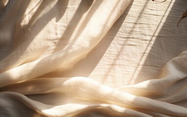 Beige linen fabric texture with folds and natural floral sunlight shadows