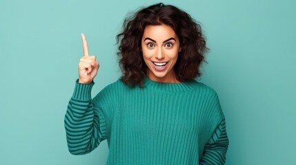 business woman showing finger pointing. smile of green theme background.