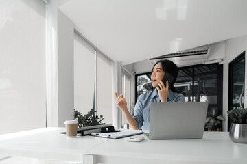 female accountant working on a tablet computer in a modern office. Make an account analysis report. real estate investment information financial and tax system concepts