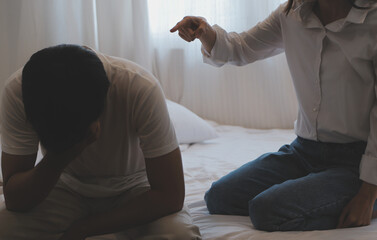 Upset woman having a fight with a man at home. Hispanic wife slapping the face of her husband...