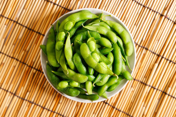 Boiled green soybeans in a bowl.