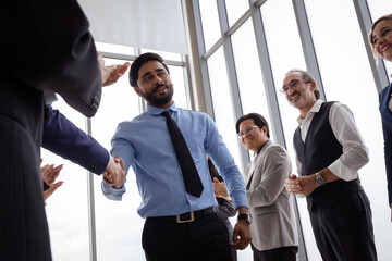 Group of multiethnic businessmen Get together for a brainstorming meeting to move the business forward.