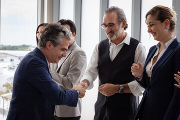 Group of multiethnic businessmen Get together for a brainstorming meeting to move the business forward.