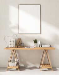 Blank large white photo poster wood frame on white wall, wooden trestle table desk with book, lamp, tray, plant, glasses and pencil in sunlight, shadow for art, mural, painting template background 3D