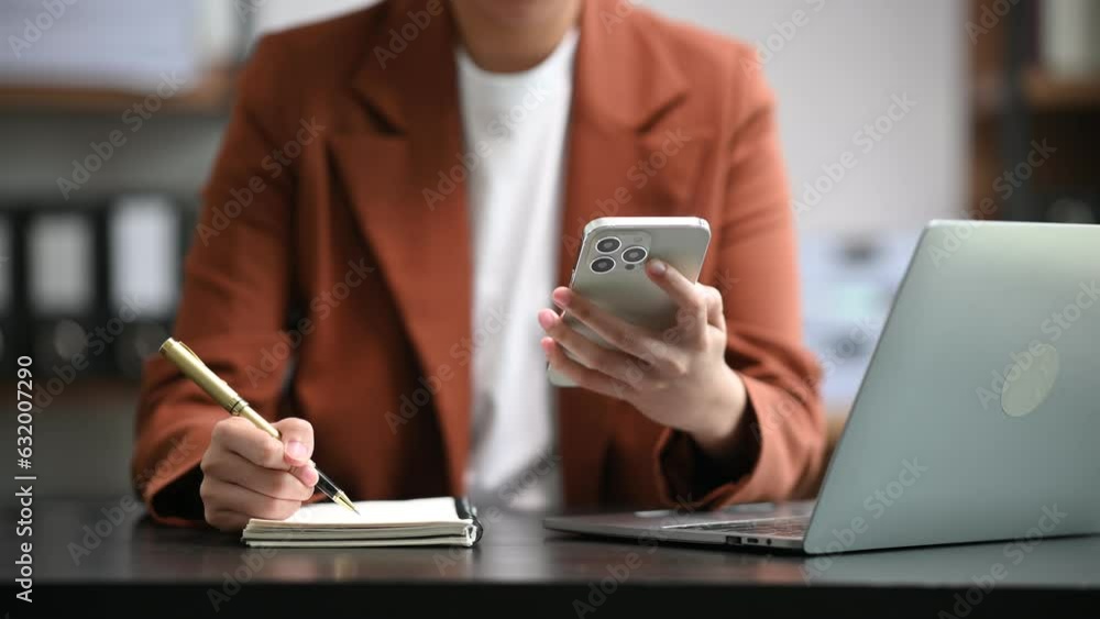Poster businessman hand working with new modern computer and writing on the notepad strategy diagram as con