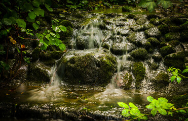 Fototapeta na wymiar long exposure of a waterfall with rocks