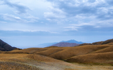 Beautiful Chocolate Hills in foothills of the desert mountains in the evening
