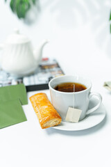 Cup of herbal tea with a snack