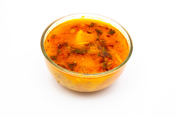 Indian potato gravy sabji on white background isolated