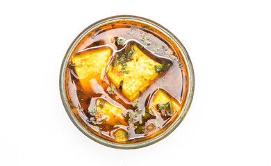 Tasty matar panneer sabji in bowl on white background, spicy cheese gravy