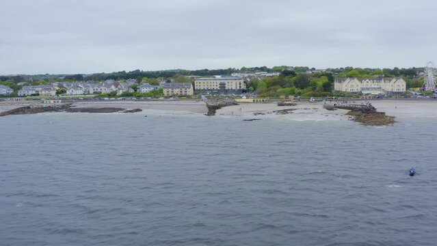 Drone aerial view of salthill galway ireland coast and homes, near ladies beach
