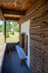 A porch of an old traditional wooden peasant house