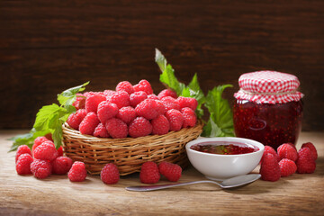Bowl of raspberry jam with fresh fruits