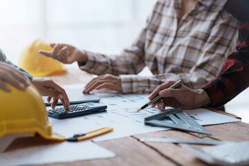 Creative Engineer and Architect Meeting for Collaborative Design and Project Planning in the Workplace.