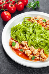 green pasta tomato sauce tagliatelle chicken meat vegetable food healthy meal snack on the table copy space food background rustic top view