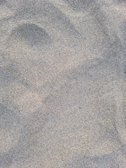 
A close-up of the sand on the beach. 