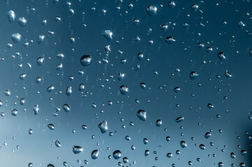 Drops of water on the glass after the rain   