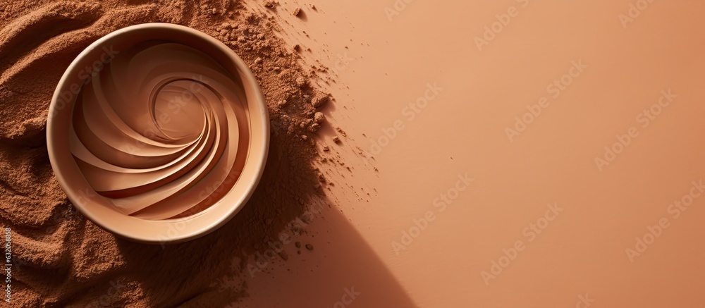 Aufkleber clay mask in a bowl for facial spa is placed on a beige background with a top view and copy space.