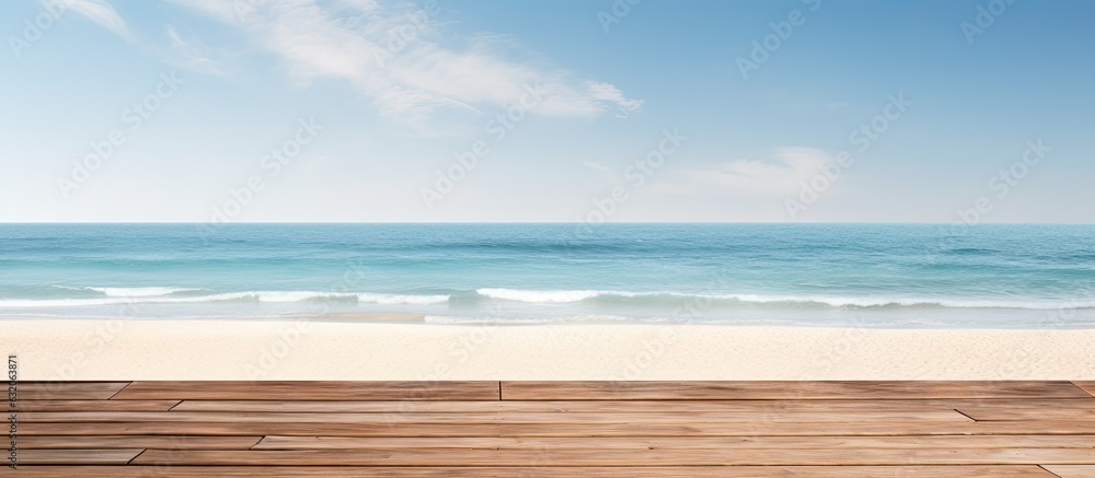 Poster A wooden table or pier is shown in the presence of a sunny beach and sea in the background. provides an ample amount of space for featuring and promoting your product.