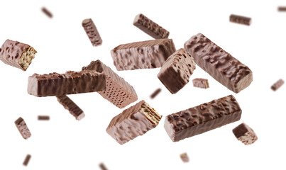 Chocolate waffles with nuts fly and levitate in space. Isolated on white