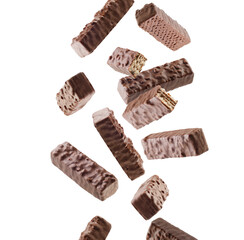 Chocolate waffles with nuts fly and levitate in space. Isolated on white