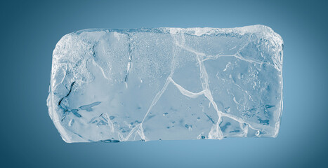 Textured cracked natural ice block, isolated on blue background.