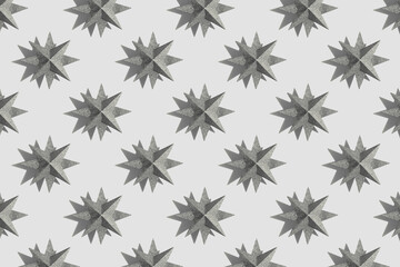 Glitter silver stars decoration pattern on gray background with shadows. Festive background. Winter minimal holiday postcard. New Year or Christmas minimal flat lay concept