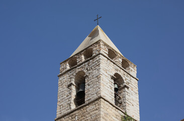 Bell tower of Sardinian church made in stones